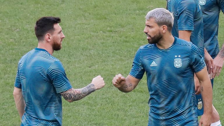 Argentina's Lionel Messi, left, and teammate Sergio Aguero talk prior to a Copa America quarterfinal soccer match against Venezuela at the Maracana stadium in Rio de Janeiro, Brazil, Friday, June 28, 2019. 