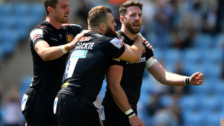 Alex Cuthbert (right) celebrates an Exeter try
