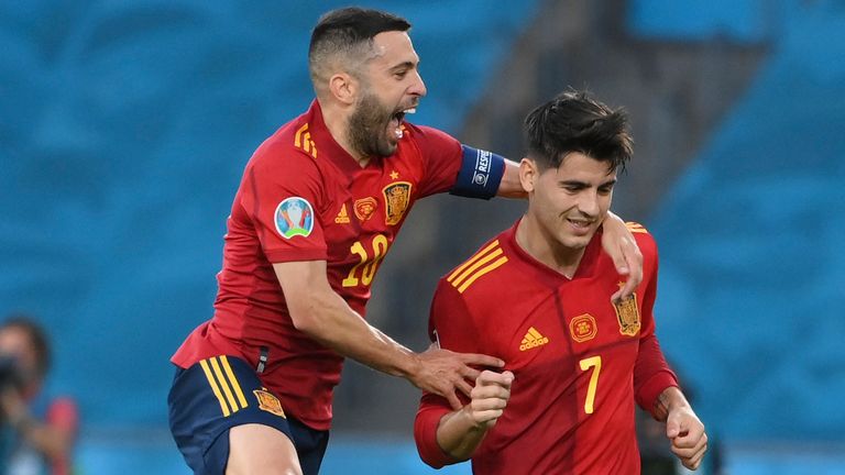 Alvaro Morata celebrates with Jordi Alba after scoring for Spain against Poland