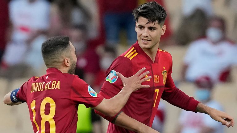 Alvaro Morata celebrates with Jordi Alba after scoring for Spain vs Poland