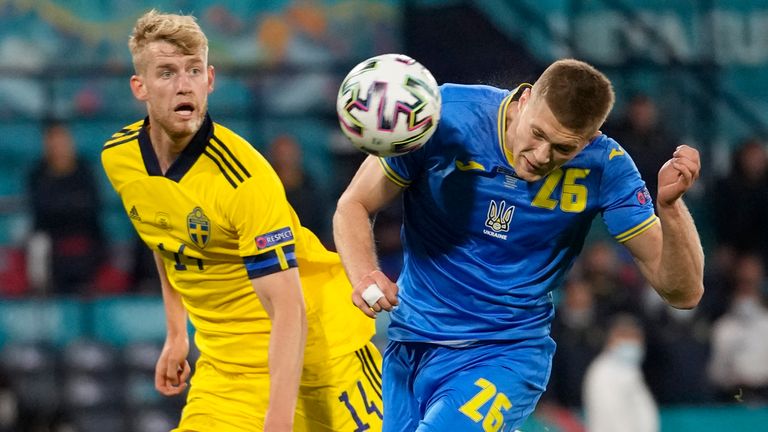 Ukraine&#39;s Artem Dovbyk scores his side&#39;s second goal during the Euro 2020 soccer championship round of 16 match between Sweden and Ukraine at the Hampden Park