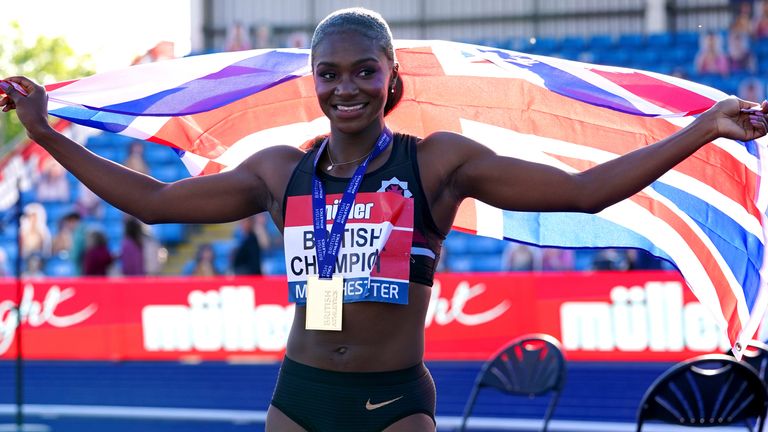 Asher-Smith celebrates after winning the Women's 100m final during day two of the Muller British Athletics Championships