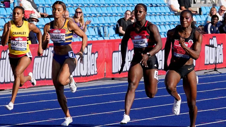 Dina Asher-Smith (right) on her way to winning the Women's 100 metre final during day two of the Muller British Athletics Championships