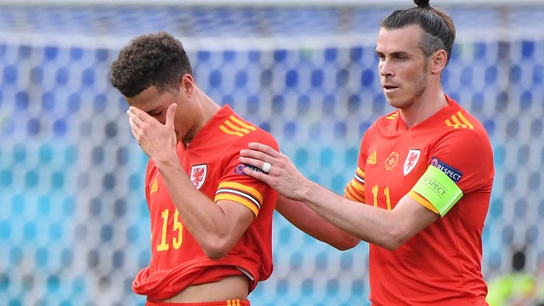 Gareth Bale consoles Ethan Ampadu after his sending off against Italy