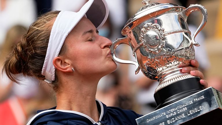 Czech Republic's Barbora Krejcikova kisses the cup after defeating Russia's Anastasia Pavlyuchenkova in their final match of the French Open tennis tournament at the Roland Garros stadium Saturday, June 12, 2021 in Paris. The unseeded Czech player defeated Anastasia Pavlyuchenkova 6-1, 2-6, 6-4 in the final. (AP Photo/Michel Euler)