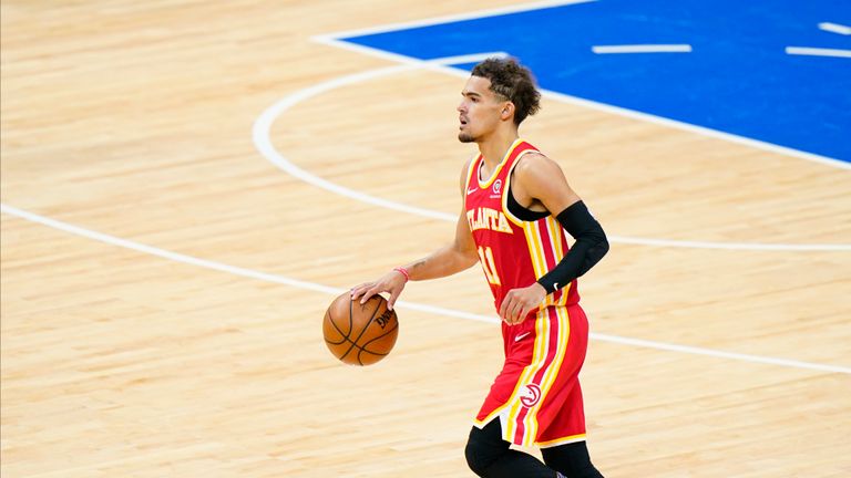 Atlanta star Trae Young made the assist for Clint Capela&#39;s spectacular alley-oop dunk as the Hawks reduced Philadelphia&#39;s second quarter lead.
