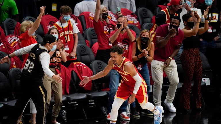 Trae Young provided the stunning assist for Kevin Huerter as Atlanta extended their lead over Milwaukee late in the first half.