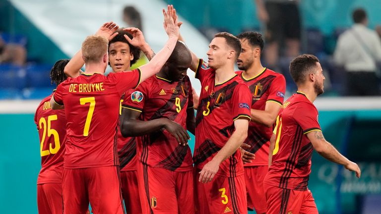Belgium players celebrate the opening goal of their team during the Euro 2020 soccer championship group B match between Finland and Belgium