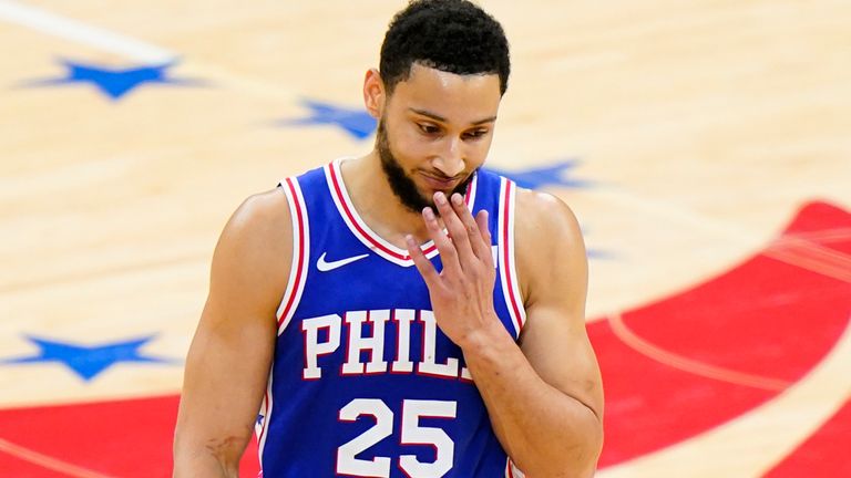 Philadelphia 76ers' Ben Simmons wipes his face after missing a pair of free-throws during the first half of Game 5