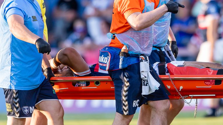 Wakefield's Bill Tupou is stretchered from the field after an injury against Castleford
