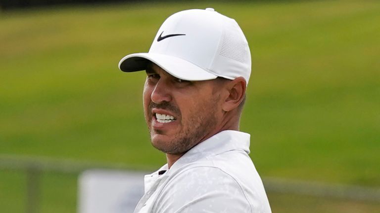 Brooks Koepka reacts after missing his birdie putt on the 11th green during the first round of the U.S. Open Golf Championship, Thursday, June 17, 2021, at Torrey Pines Golf Course in San Diego. (AP Photo/Marcio Jose Sanchez)