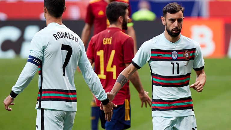 Bruno Fernandes and Cristiano Ronaldo in action for Portugal