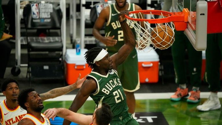 Milwaukee Bucks&#39; Jrue Holiday dunks during the first half of Game 1 of the NBA Eastern Conference basketball finals game against the Atlanta Hawks Wednesday, June 23, 2021, in Milwaukee. (AP Photo/Morry Gash)


