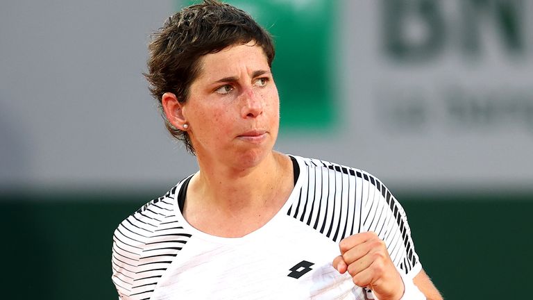 Carla Suarez Navarro of Spain celebrates in their ladies first round match against Sloane Stephens of The United States during day three of the 2021 French Open at Roland Garros on June 01, 2021 in Paris, France. (Photo by Julian Finney/Getty Images)