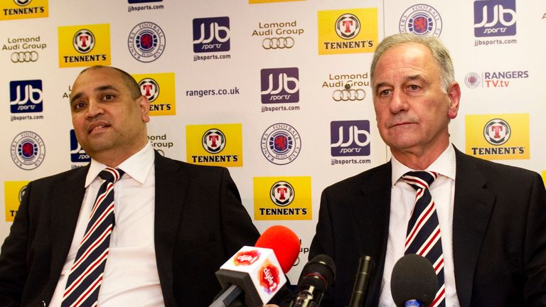 14/06/12.IBROX - GLASGOW.New Rangers owner Charles Green (right) and new Rangers non-executive Director Imran Ahmad prepare to address the media