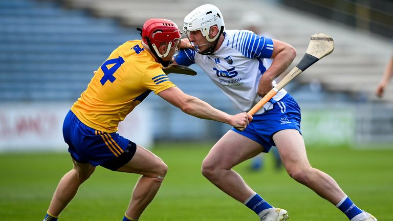 Shane Bennett of Waterford in action against Paul Flanagan of Clare