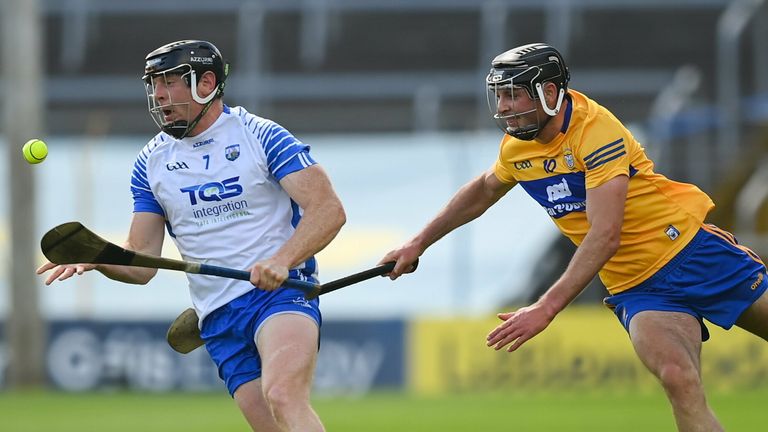 Kevin Moran of Waterford in action against Cathal Malone of Clare