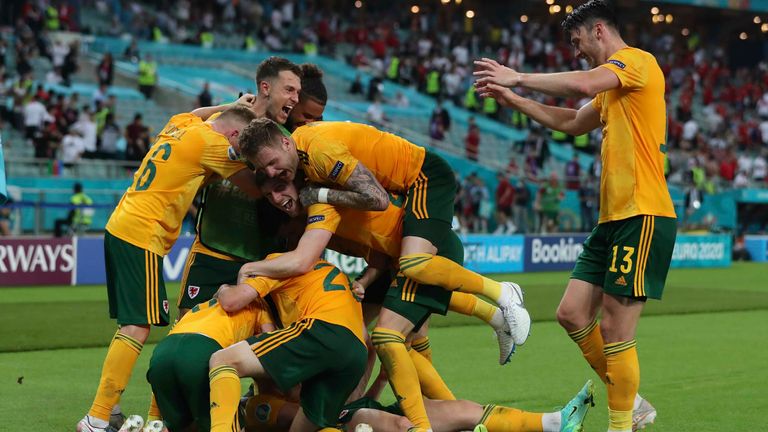 A pile-on ensued after Connor Roberts celebrated Wales' winning goal against Turkey