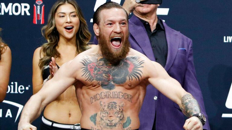 Conor McGregor poses during a ceremonial weigh-in for the UFC 246 mixed martial arts bout, Friday, Jan. 17, 2020, in Las Vegas. McGregor is scheduled to fight Donald &#34;Cowboy&#34; Cerrone in a welterweight bout Saturday in Las Vegas. (AP Photo/John Locher)