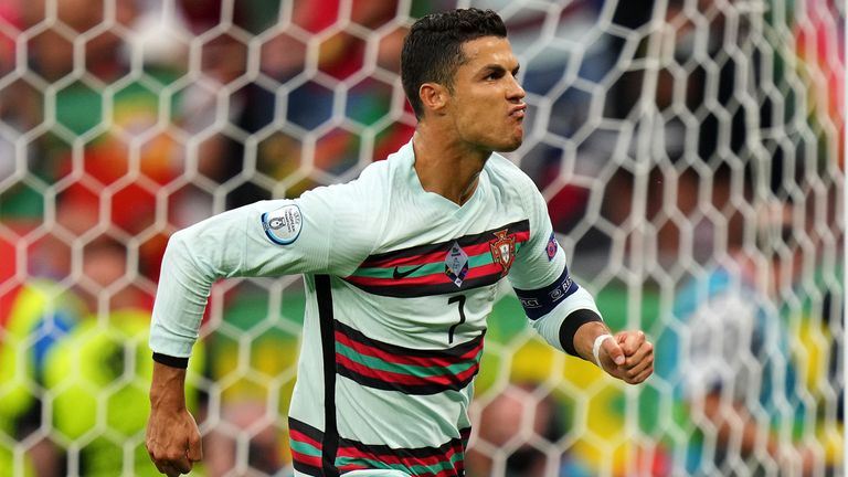 Cristiano Ronaldo celebrates after scoring Portugal&#39;s second goal against Hungary