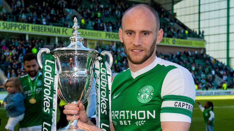 Hibernian captain David Gray celebrates with the Championship trophy