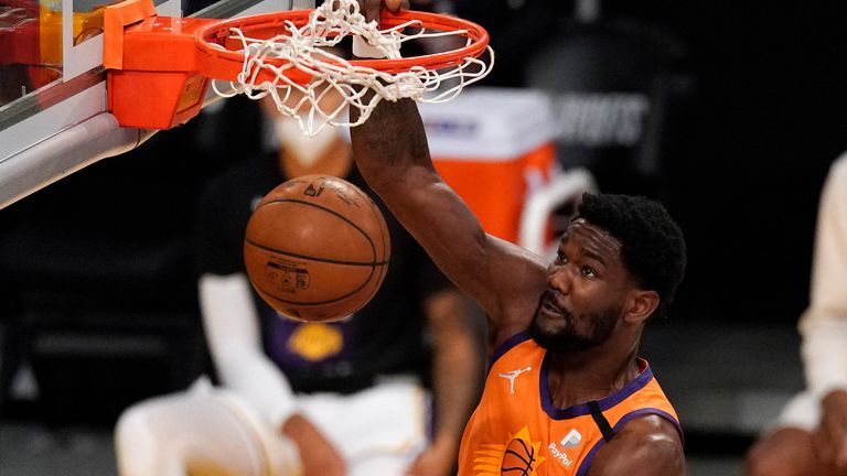 Phoenix Suns center Deandre Ayton dunks during the first half in Game 4 of an NBA basketball first-round playoff series against the Los Angeles Lakers Sunday, May 30, 2021, in Los Angeles.
