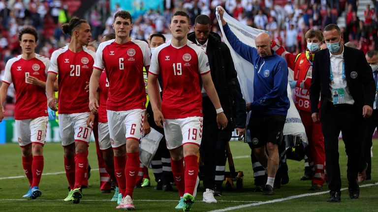 Paramedics using a stretcher to take out of the pitch Denmark&#39;s Christian Eriksen after he collapsed during the Euro 2020 soccer championship group B match between Denmark and Finland at Parken stadium in Copenhagen, Denmark, Saturday, June 12, 2021