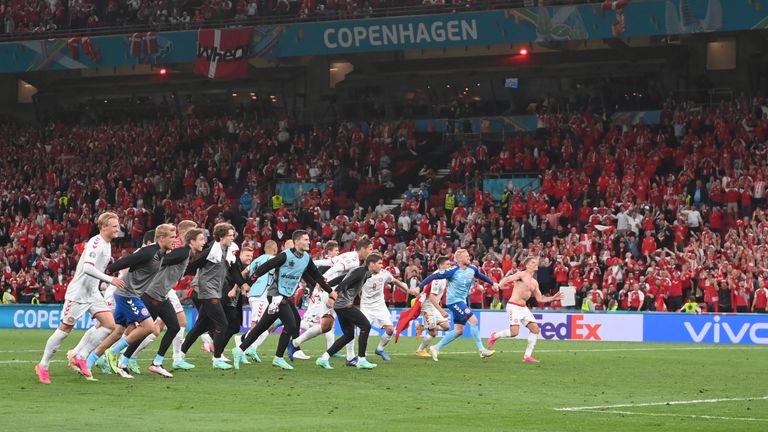 Denmark players celebrate reaching the Euro 2020 last-16