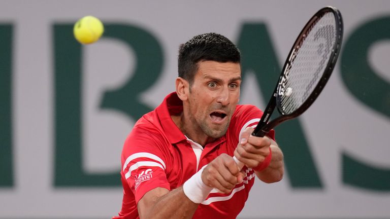 Top seed Djokovic produced a vintage display to triumph in the first ever men's night match at the French Open