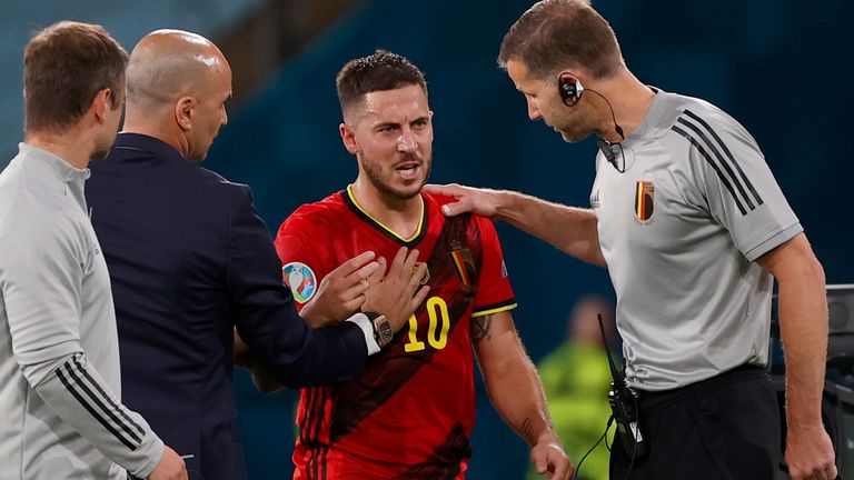Eden Hazard was treated by Belgium's medical team after pulling up in the latter stages of their win over Portugal