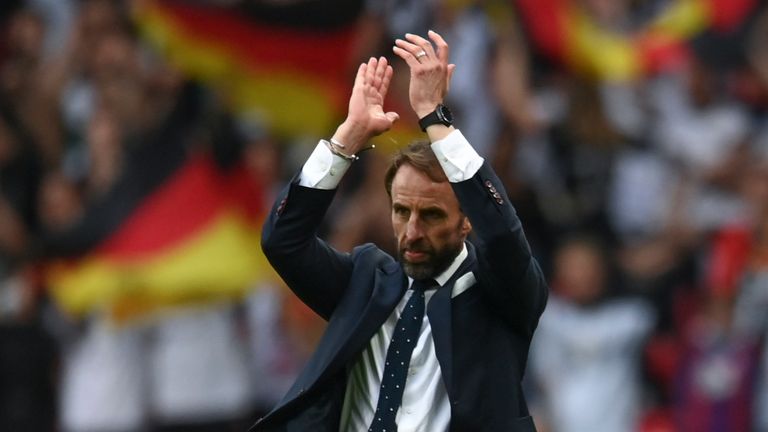 England&#39;s manager Gareth Southgate applauds fans at the end of the Euro 2020 soccer championship round of 16 match between England and Germany, at Wembley stadium in London, Tuesday, June 29, 2021. England won 2-0. (Andy Rain, Pool via AP)