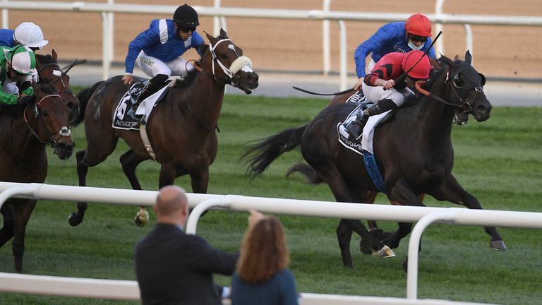 Extravagant Kid with jockey Ryan Moore wins the Group One Al Quoz Sprint in Dubai