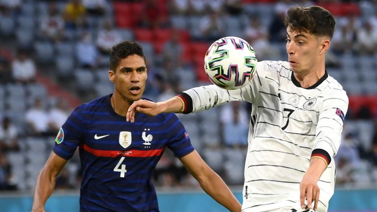 France's Raphael Varane challenges Germany's Kai Havertz