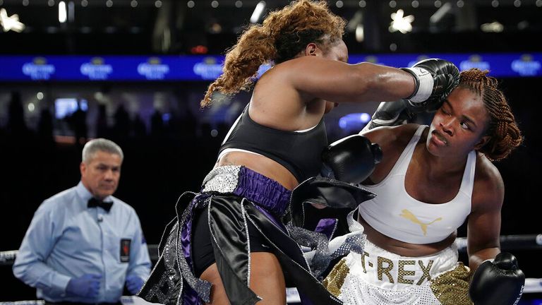 Franchon Crews, left, and Claressa Shields fight during a women's super middleweight bout, Saturday, Nov. 19, 2016, in Las Vegas. (AP Photo/John Locher)
