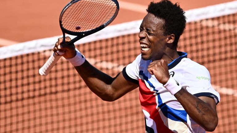 France's Gael Monfils celebrates after winning against Spain's Albert Ramos-Vinolas during their men's singles first round tennis match on Day 3 of The Roland Garros 2021 French Open tennis tournament in Paris on June 1, 2021. (Photo by Anne-Christine POUJOULAT / AFP) (Photo by ANNE-CHRISTINE POUJOULAT/AFP via Getty Images)