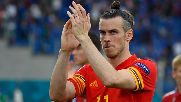 Gareth Bale applauds fans after Wales' loss to Italy