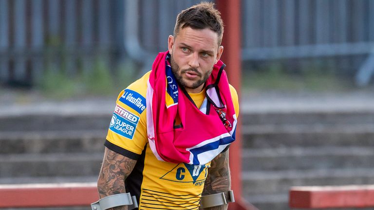 Castleford's Gareth O'Brien is dejected after taking an injury against Wakefield that forces him off the field.