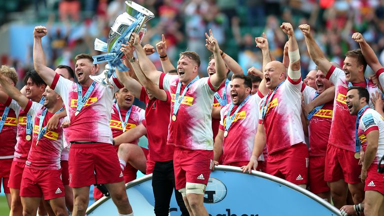 Harlequins players celebrate after winning the Gallagher Premiership final at Twickenham Stadium,…