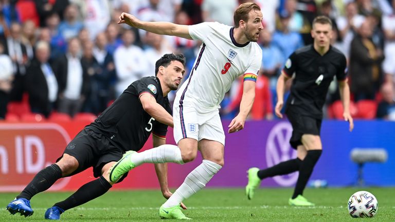 England&#39;s Harry Kane, right, is challenged by Germany&#39;s Mats Hummels during the Euro 2020 soccer championship round of 16 match between England and Germany, at Wembley stadium in London, Tuesday, June 29, 2021. (Andy Rain, Pool via AP)