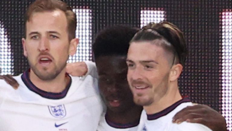 Jack Grealish (right) celebrates with England teammates Harry Kane (left) and Bukayo Saka (Getty)