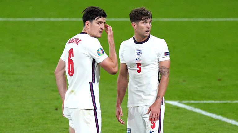 England&#39;s Harry Maguire (left) and John Stones in discussion during the UEFA Euro 2020 Group D match at Wembley Stadium, London