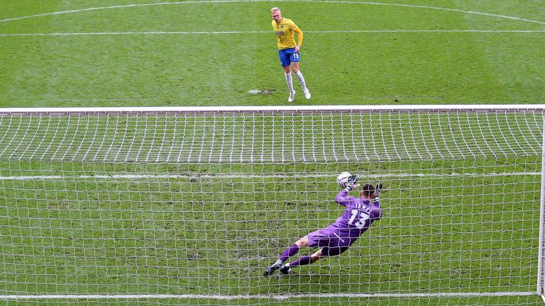 Hartlepool goalkeeper Brad James saves Matt Buse's penalty to seal National League play-off final victory (PA)