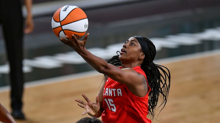 Atlanta guard Tiffany Hayes drives to the basket during the WNBA game against the Dallas Wings