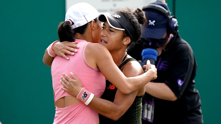 Great Britain's Heather Watson hugs China's Zhang Shuai after the latter is forced to retire from their match. (PA)