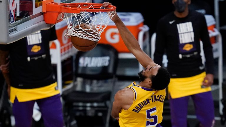 Los Angeles Lakers guard Talen Horton-Tucker dunks the ball during the fourth quarter of Game 6 of an NBA basketball first-round playoff series against the Phoenix Suns