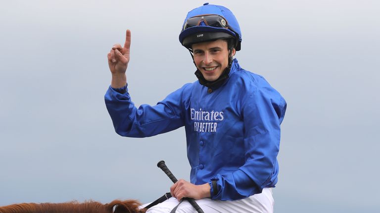 Jockey William Buick celebrates after winning the Dubai Duty Free Irish Derby on Hurricane Lane