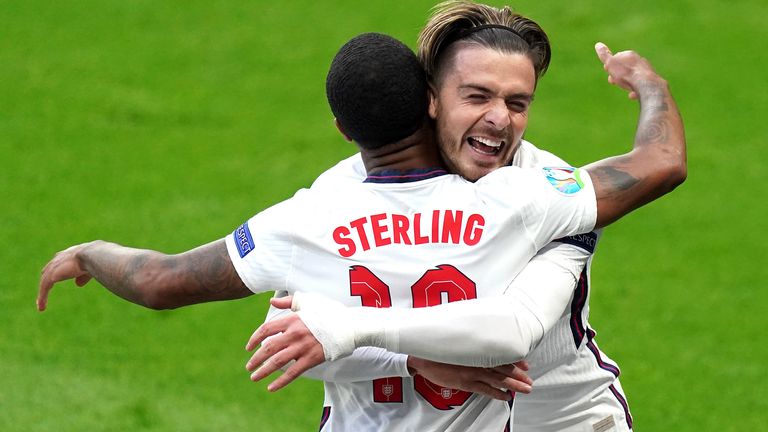Raheem Sterling celebrates with Jack Grealish after opening the scoring against Czech Republic
