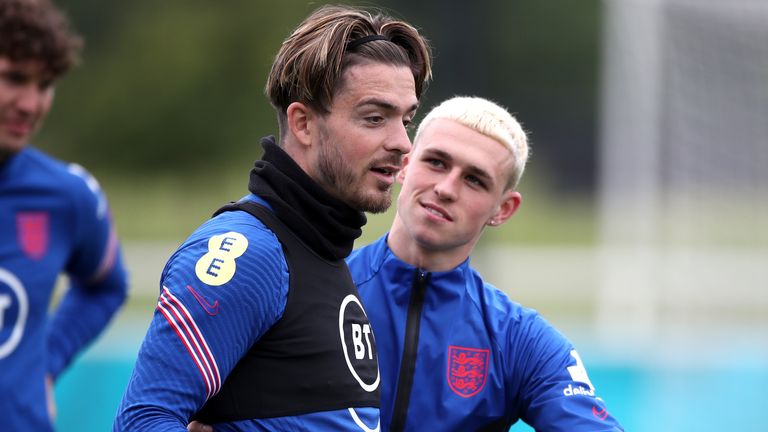 Jack Grealish with Manchester City forward Phil Foden during England training