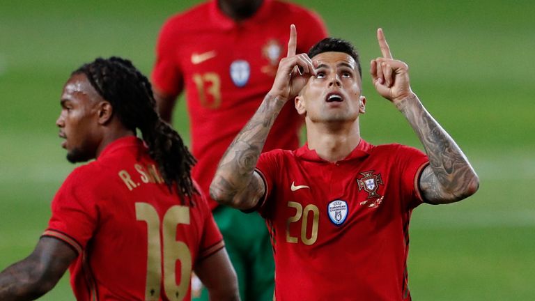 Joao Cancelo celebrates his strike to make it 3-0