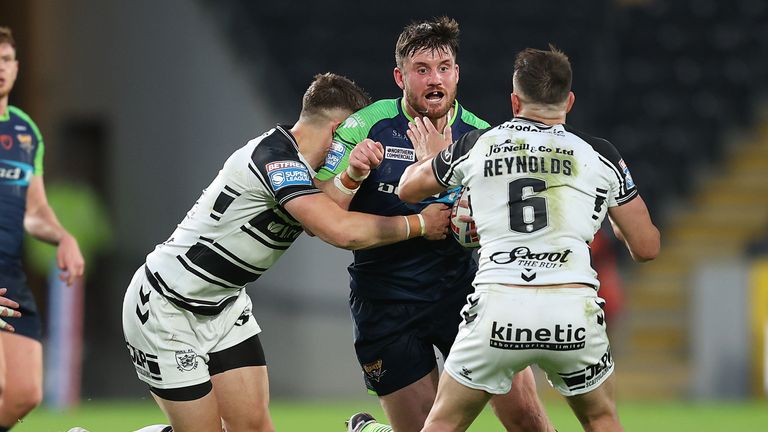 Joe Greenwood in action with Hull FC's Josh Reynolds